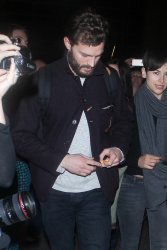 Jamie Dornan - Spotted at at LAX Airport with his wife, Amelia Warner - January 13, 2015 - 69xHQ BMjOP3tK