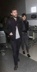 Jamie Dornan - Spotted at at LAX Airport with his wife, Amelia Warner - January 13, 2015 - 69xHQ F1vS19P2