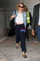 Jennifer Lawrence bares her midriff arriving at JFK airport, New York. 09/23/2016